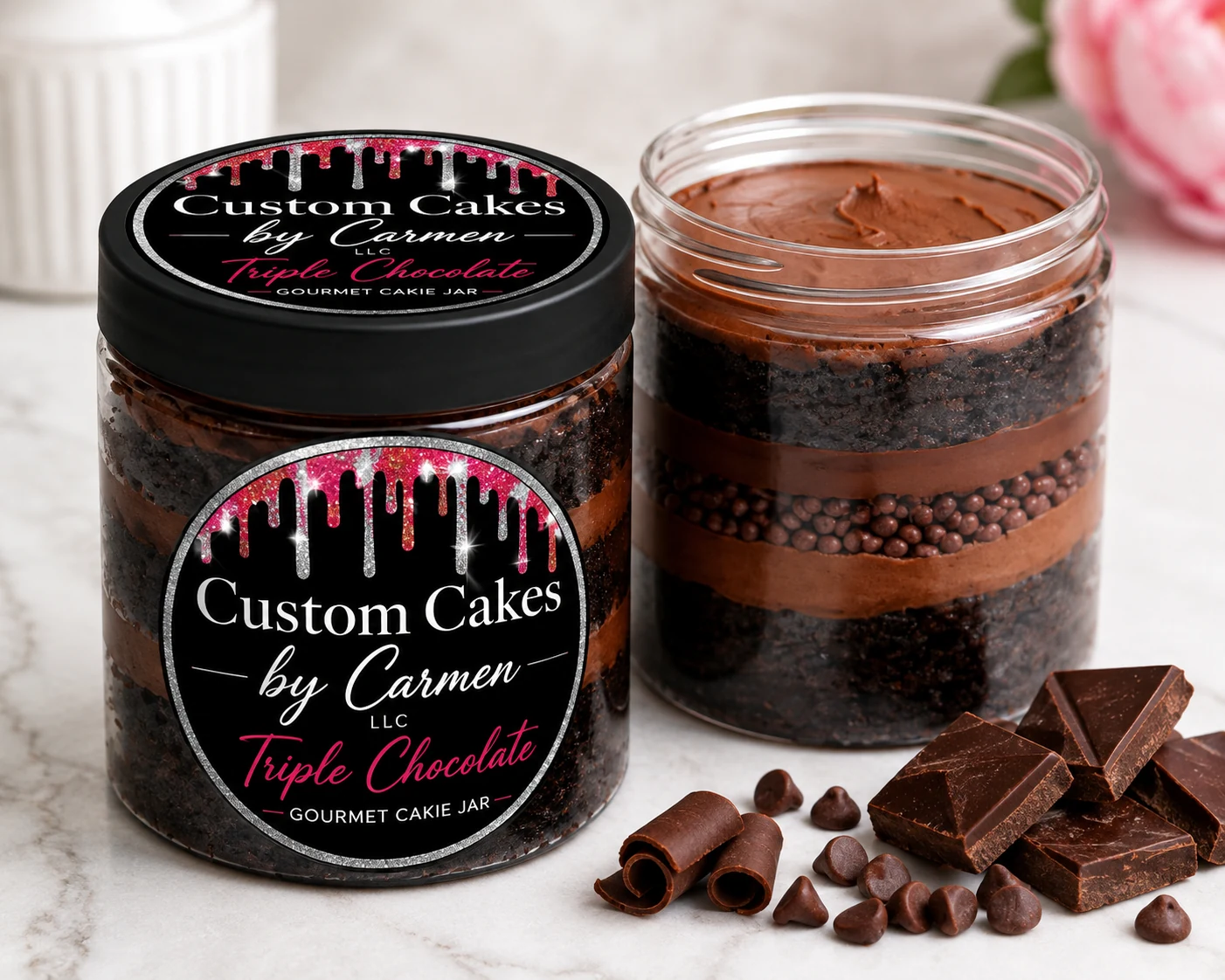 Layered triple chocolate dessert jars styled with chocolate pieces and curls